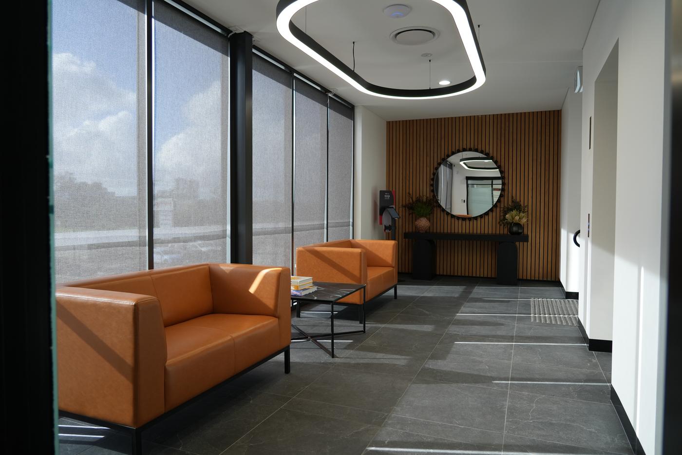Bright lounge and waiting area on the second floor of The Advanced Group's new office